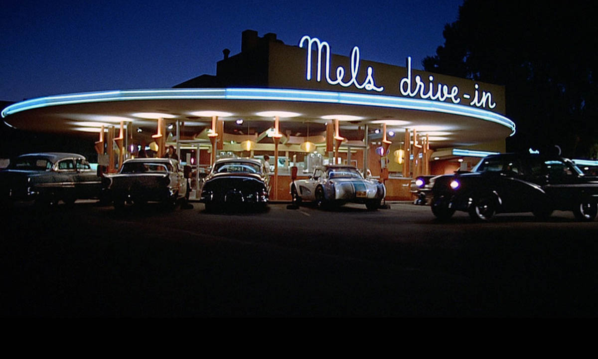 A picture of the cars in the American Graffiti movie