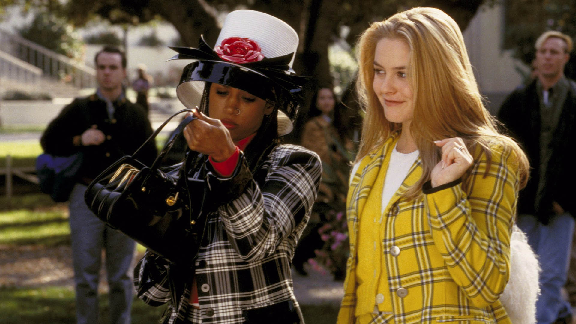 The main characters of Clueless movie with checkered costumes