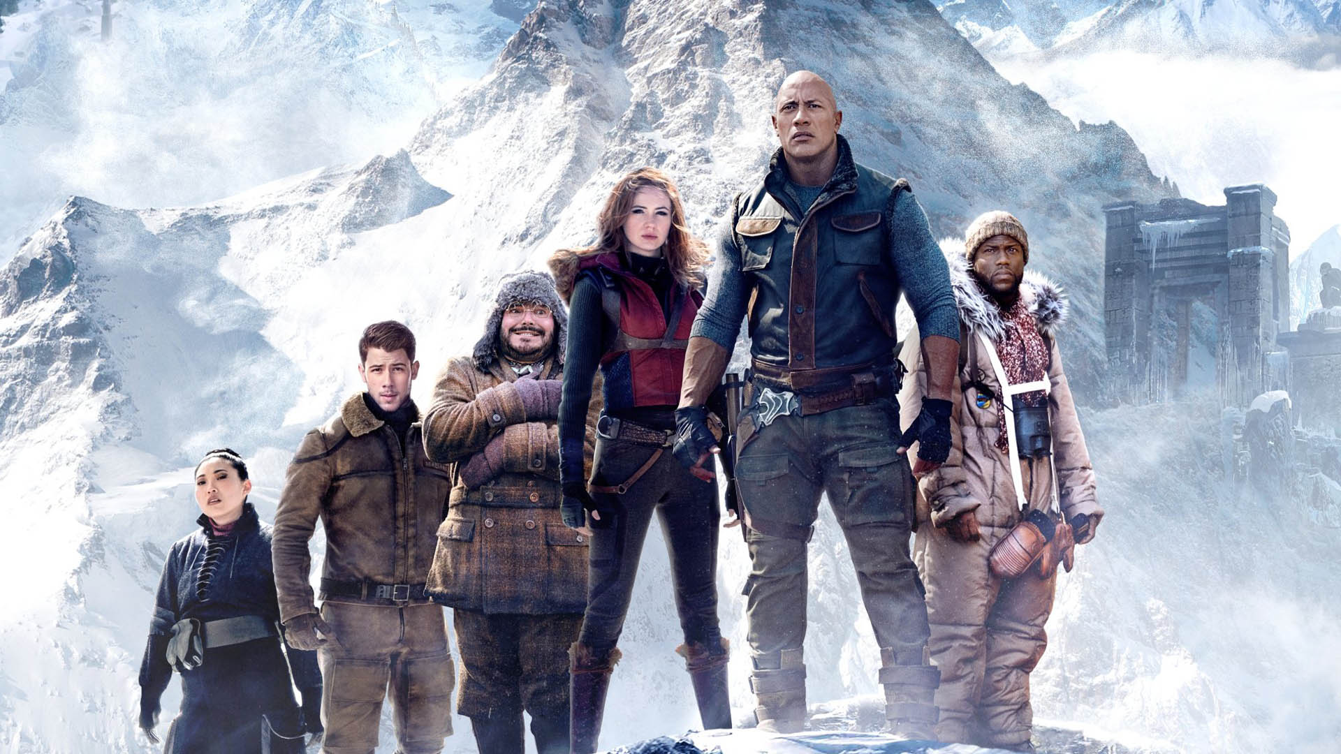 The main characters of the Jumanji movie series are among the snow-capped mountains