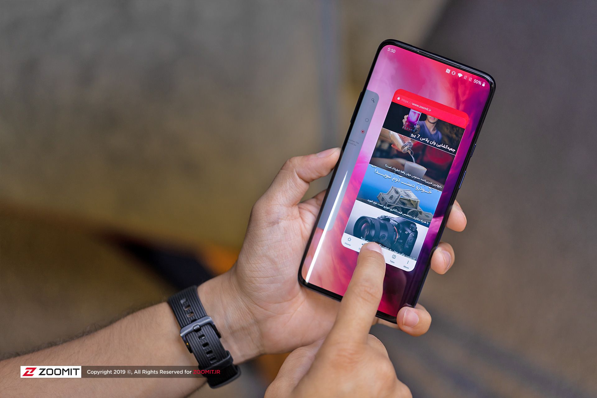 OnePlus 7 Pro in the right hand of the user