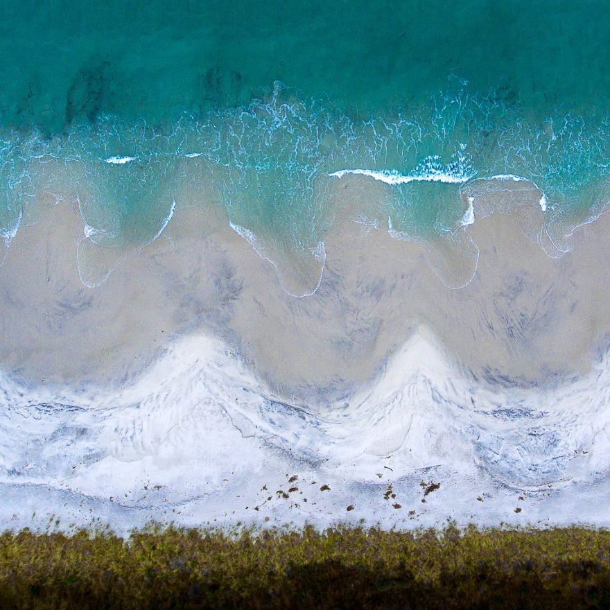 Abstract aerial photography of the coastline / Timothy Moon