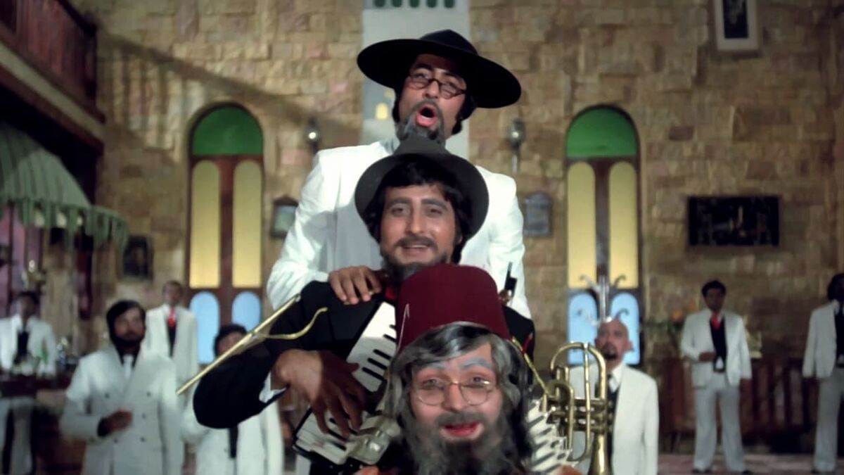 Vinod Khanna, Rishi Kapoor and Amityab Bachchan as Amar Akbar Antony