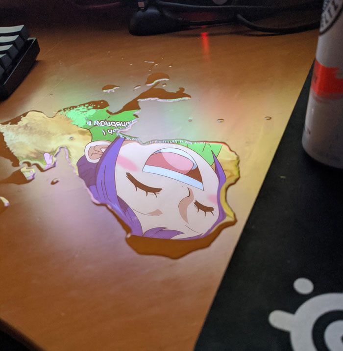 Anime reflection in spilled coffee