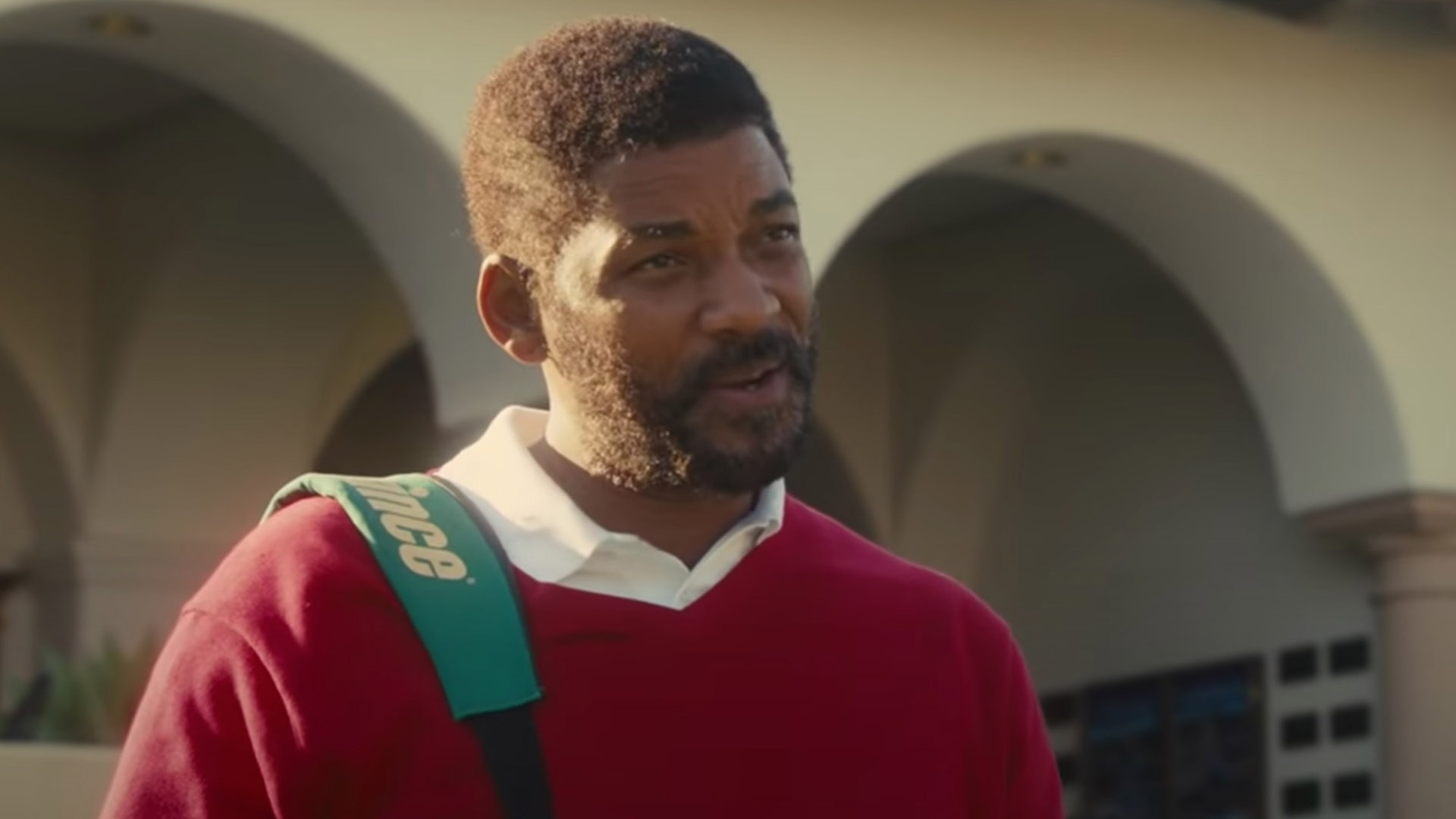 Will Smith in a red sweater in the movie King Richard