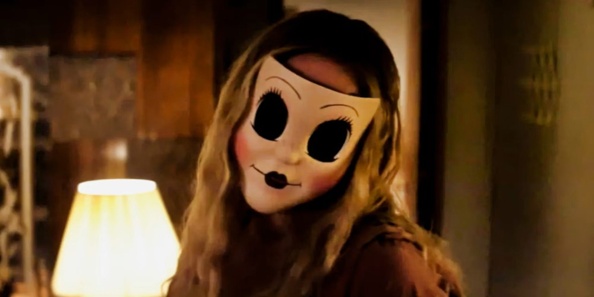 A doll mask in the movie Strangers - a girl with a doll mask